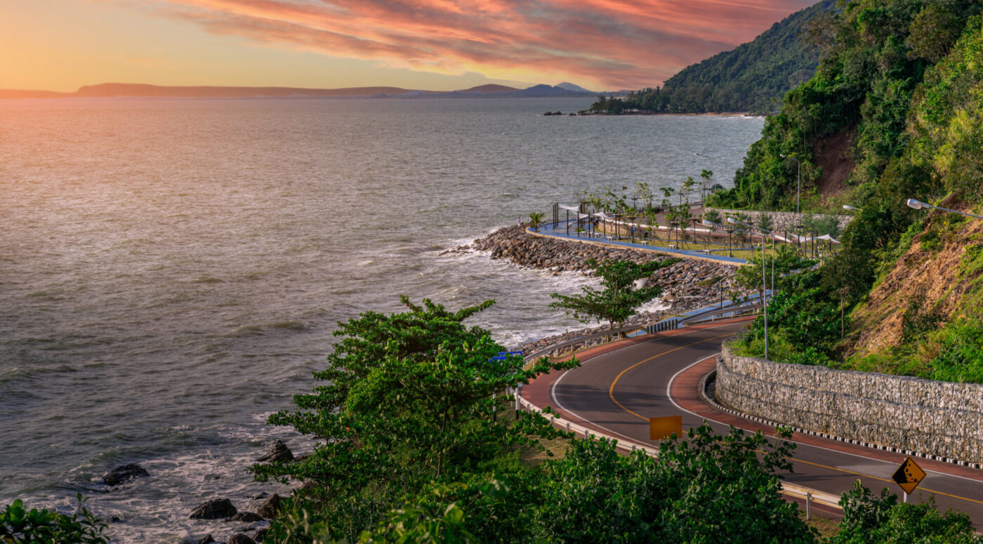 Sunset view of coastal road on Kung Wiman Beach (Photo Credit: iStockphoto)