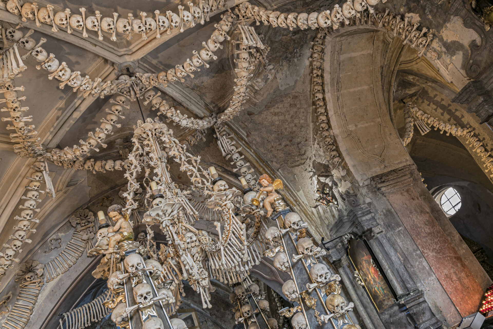 Decoration of skulls and skeletons inside Sedlec Ossuary (Photo Credit: iStockphoto)