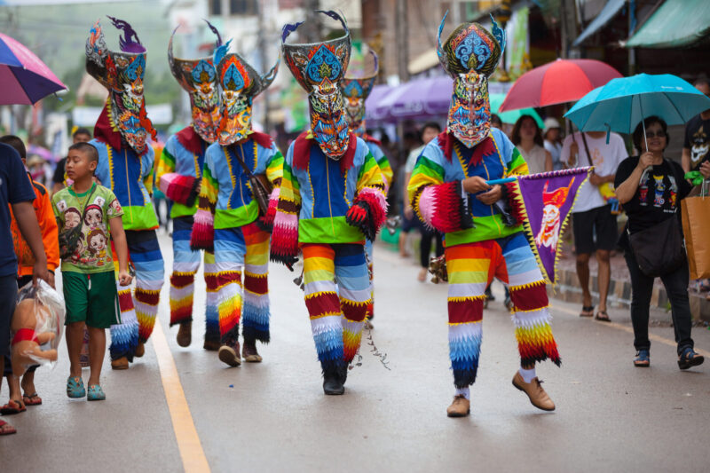 Phi Ta Khon in the procession of the Bun Luang festival (Photo Credit: iStockphoto)