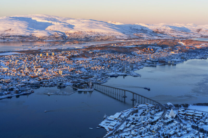 Tromsø is a sprawling island covering 2,521 square kilometers, surrounded by dramatic fjords and majestic mountains. (Photo Credit: iStockphoto)