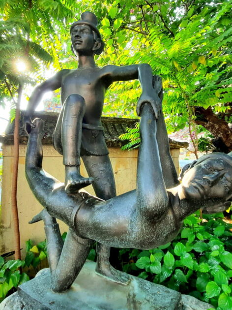 Hermit Statue in Stretching Pose (Photo Credit: iStockphoto)