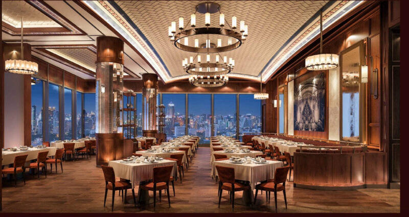 The elegant interior with a view of Bangkok skyline. 