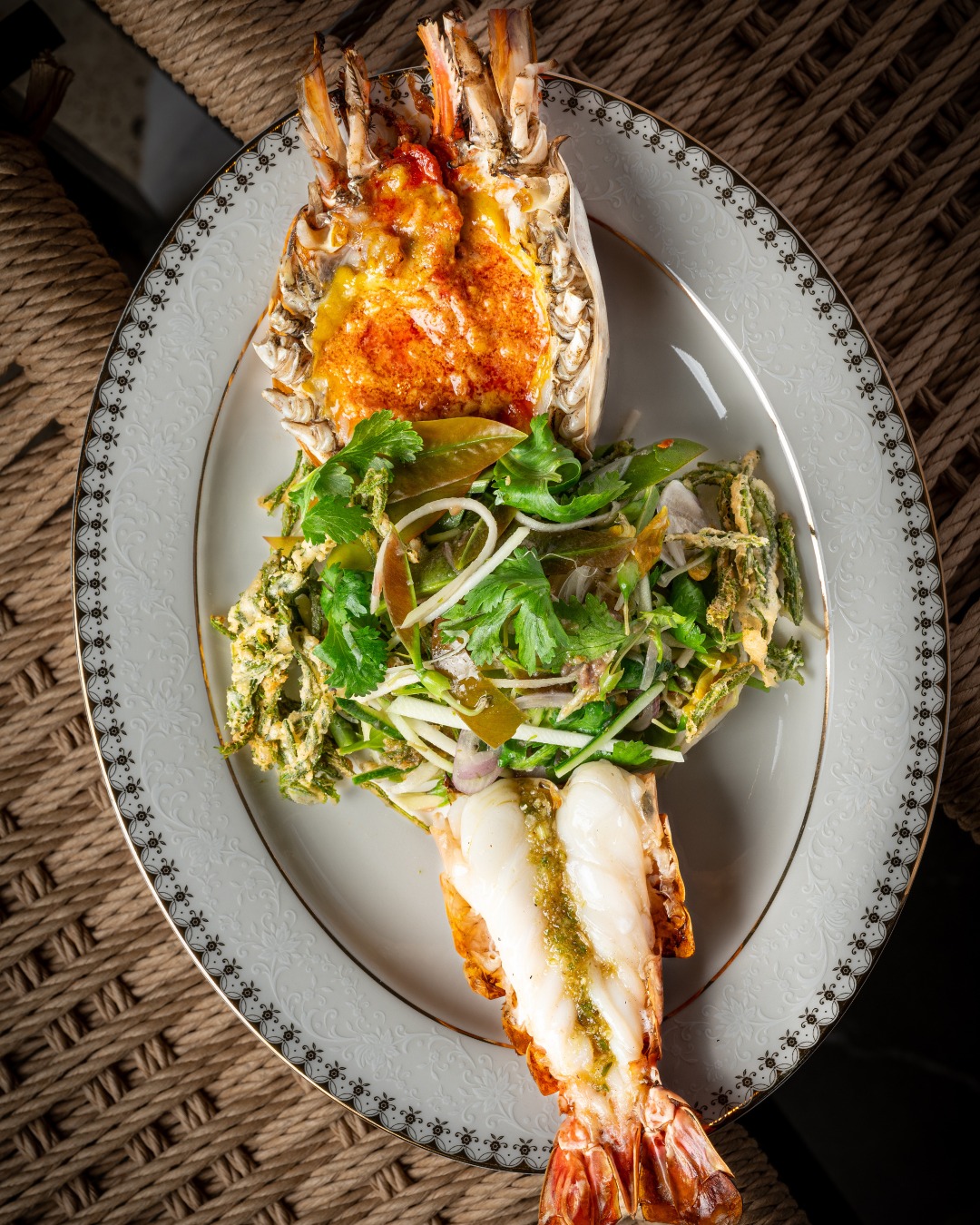 Grilled river prawn with Nam-prik-kapi (chili relishes) and deep fried cha-om (acacia).