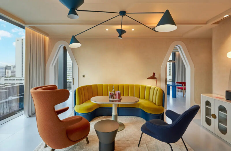 A playful interior with a view of Bangkok city.