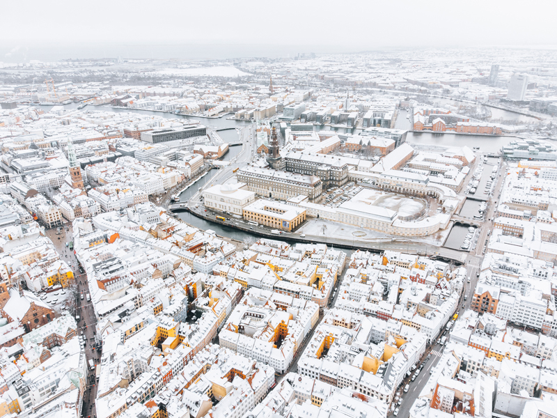 A view of Copenhagen: N&oslash;rreport, the Cathedral, and Christiansborg Palace in winter.