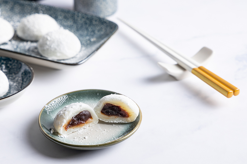 The chewy texture of mochi/rice cakes represents family togetherness&mdash;staying bonded and sweet all year long.