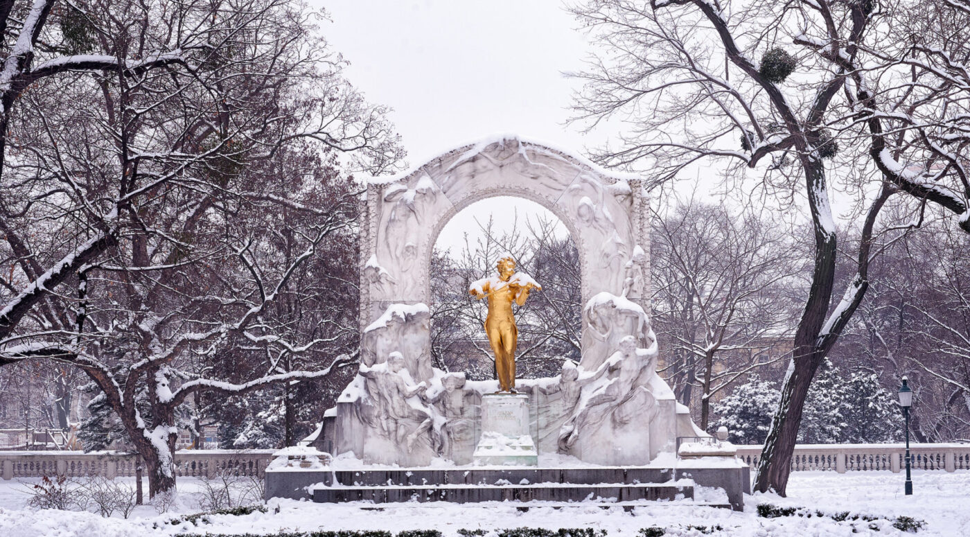 Golden monument of Johann Strauss in city park of Vienna Austria
