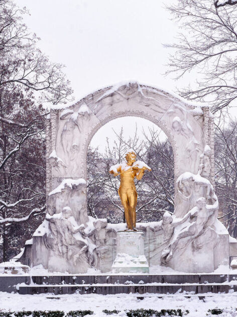 Golden monument of Johann Strauss in city park of Vienna Austria