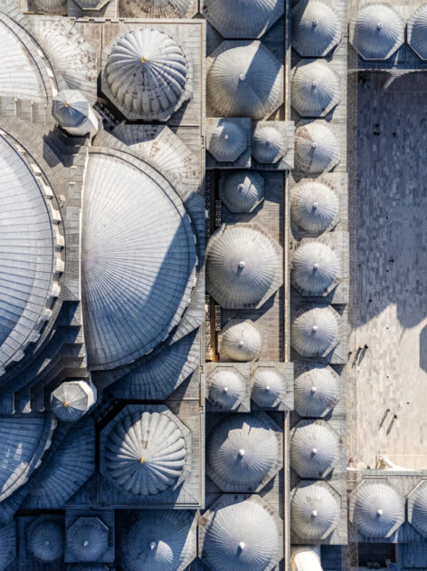 Aerial top-down view of the Suleymaniye Mosque dome and courtyard in Istanbul, Turkiye.