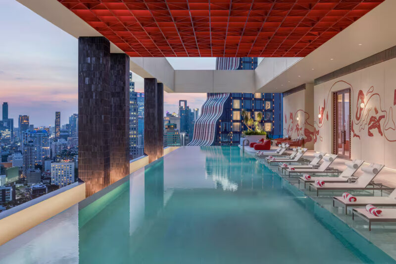 Unwind against the backdrop of the iconic Bangkok skyline.