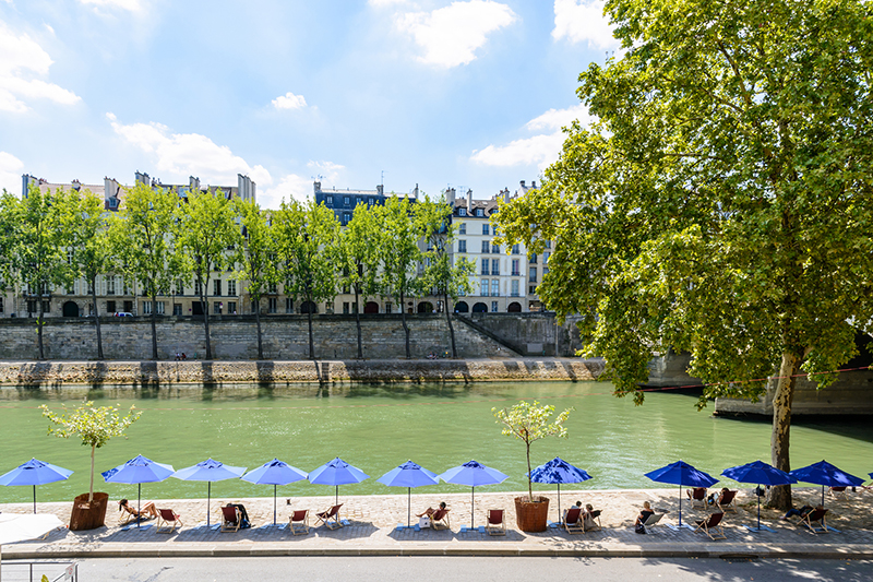The Seine whispers a quieter story of Paris.