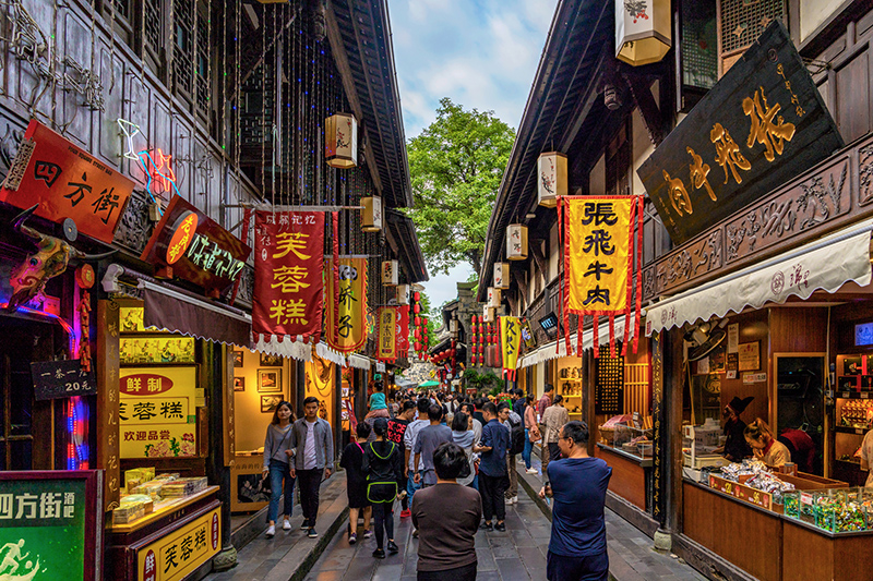 Traditional Chinese alley with shops and stalls at Jinli Ancient Street.