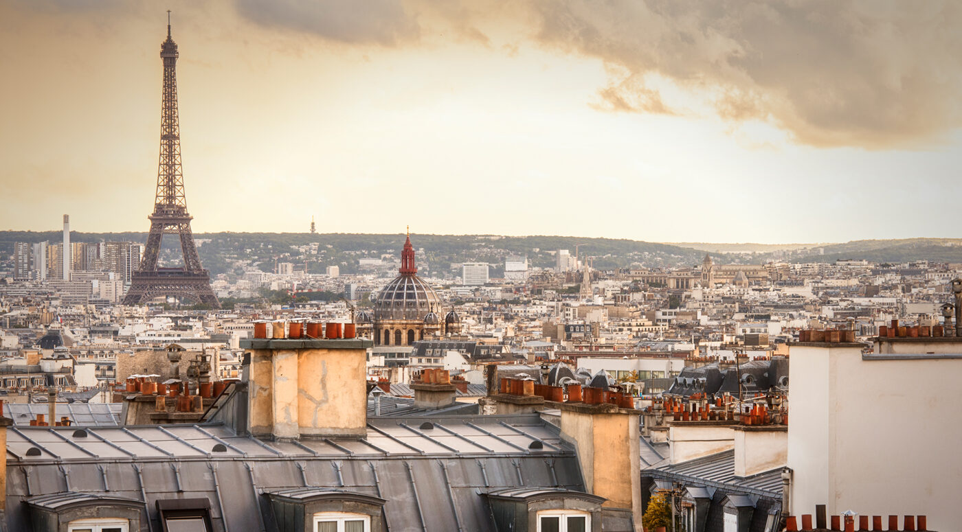 Paris scenes with typical roofs and Eiffel.