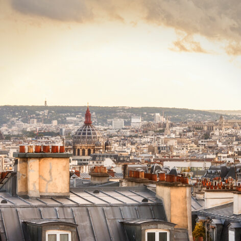 Paris scenes with typical roofs and Eiffel.