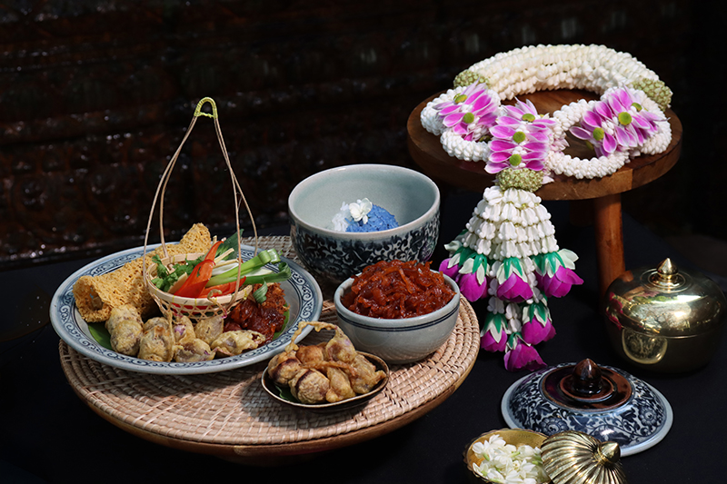 "Khao Chae" served with a full set of side dishes at Anantara Chiang Mai.