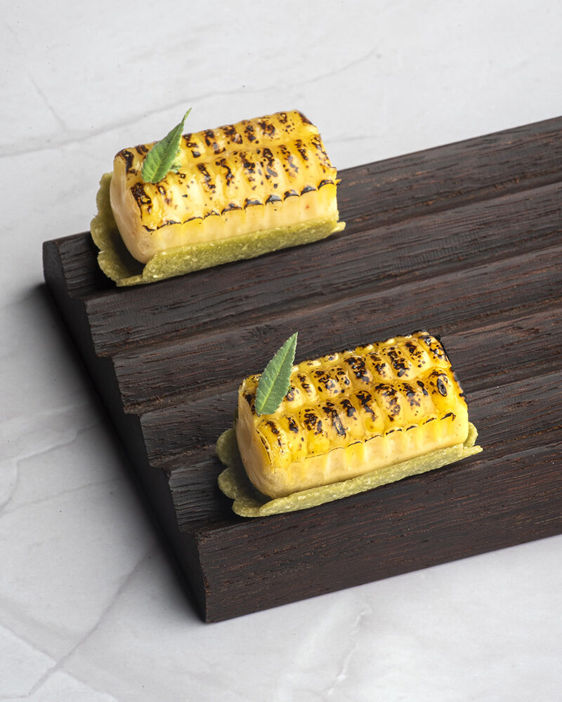 Charred sweet corn, a subtle nod to Chef Evens&rsquo;s Peruvian childhood.