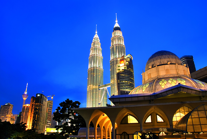 Famous Asy-Syakirin Mosque with Petronas Towers at the background.