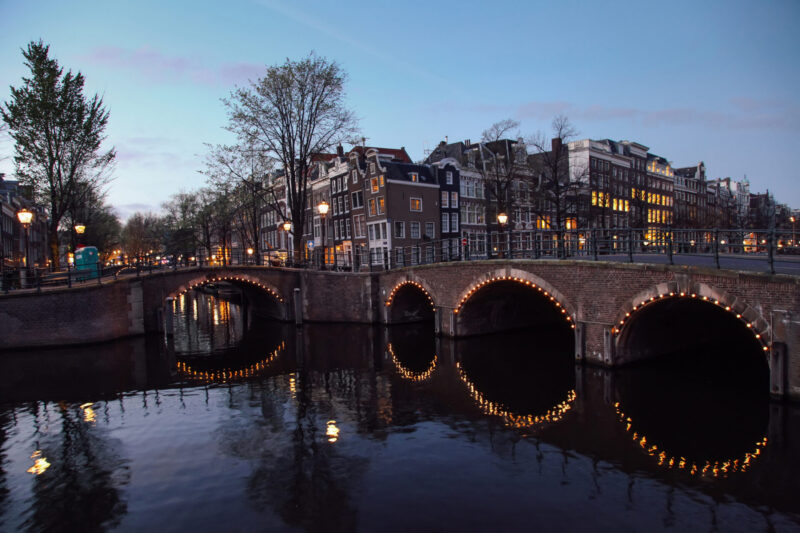 Amsterdam canal bridge and Dutch houses.