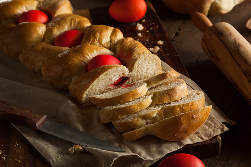 Homemade Greek Easter Bread with Red Eggs.