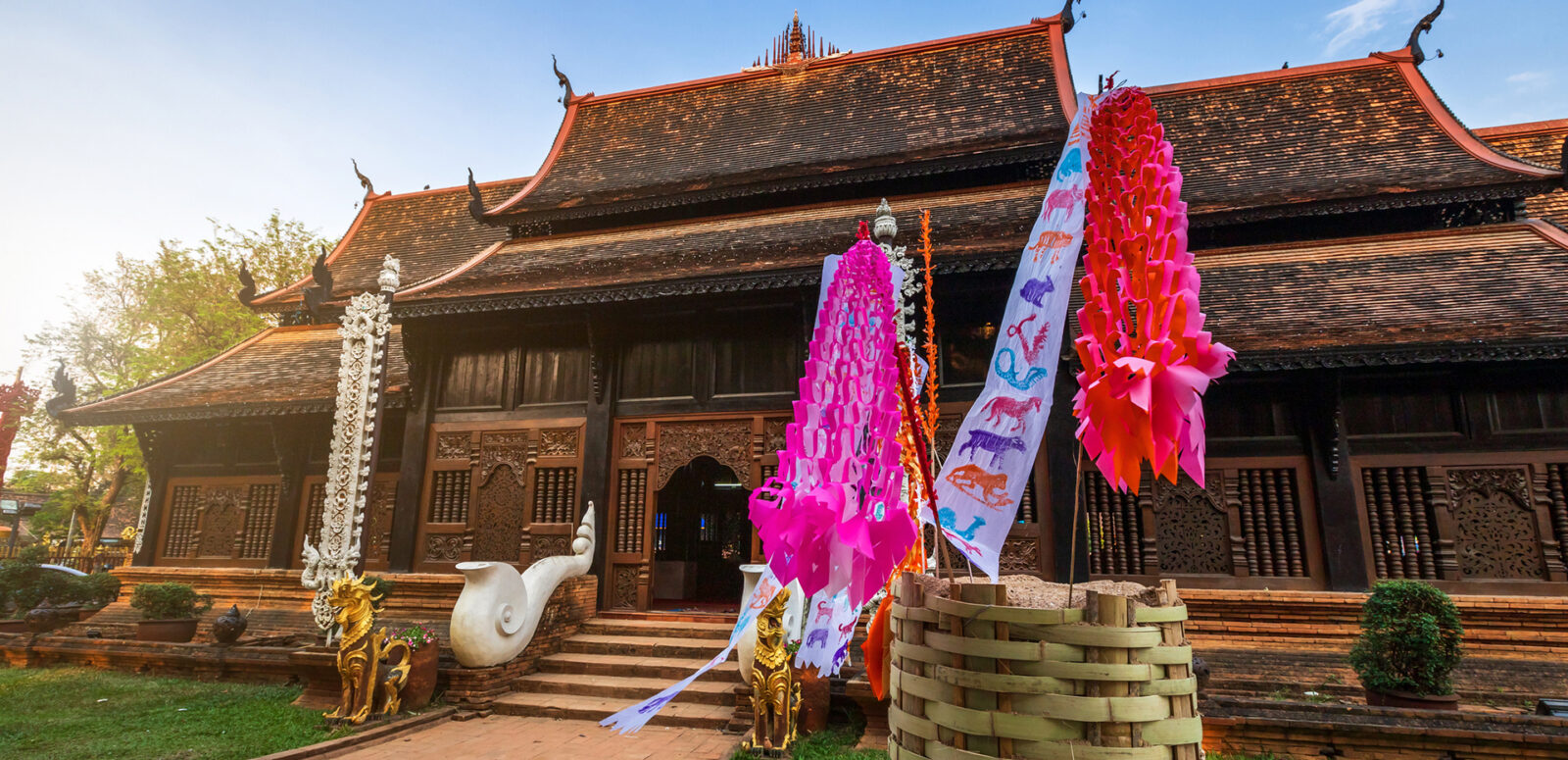 Traditional flags hang on sand pagoda in the Wat Lok Moli temple for Songkran Festival.