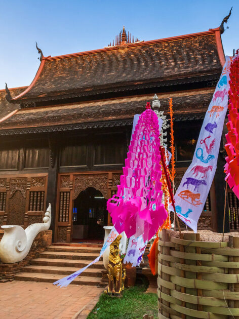 Traditional flags hang on sand pagoda in the Wat Lok Moli temple for Songkran Festival.