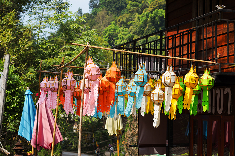 Northern Thai lantern decor in front of the house in Mae Kampong village.