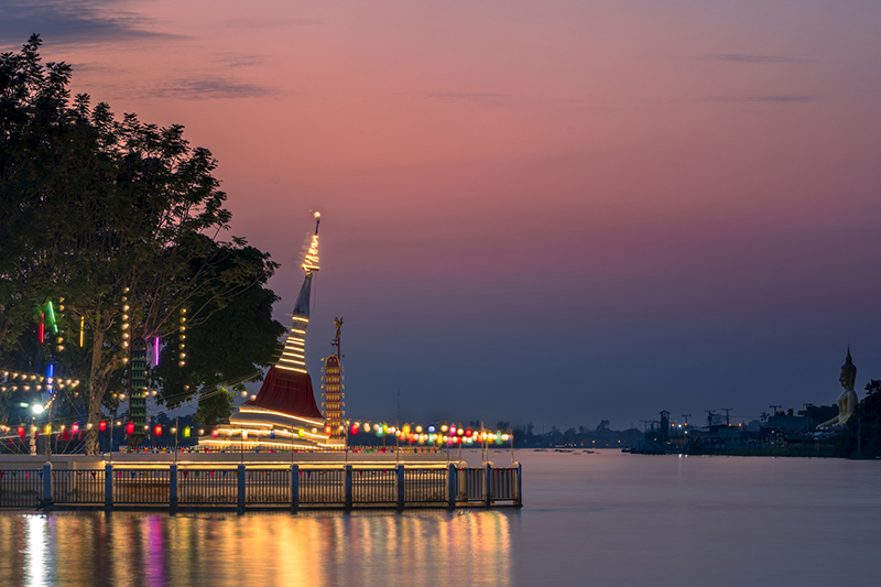 Known for its leaning, white Mon-style stupa (chedi) located at the corner of the island.