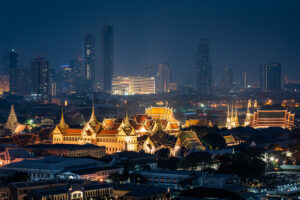 The Grand Palace in Bangkok illuminated at night.