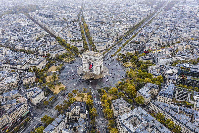 Viewing the Arc de Triomphe from above reveals the star-shaped geometry of the city plan.