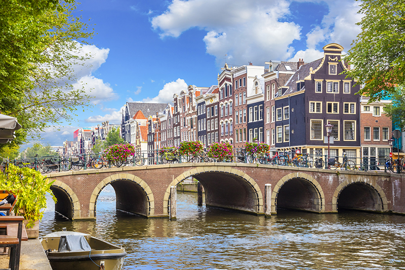There is something timeless about the way these historic houses lean into the water.
