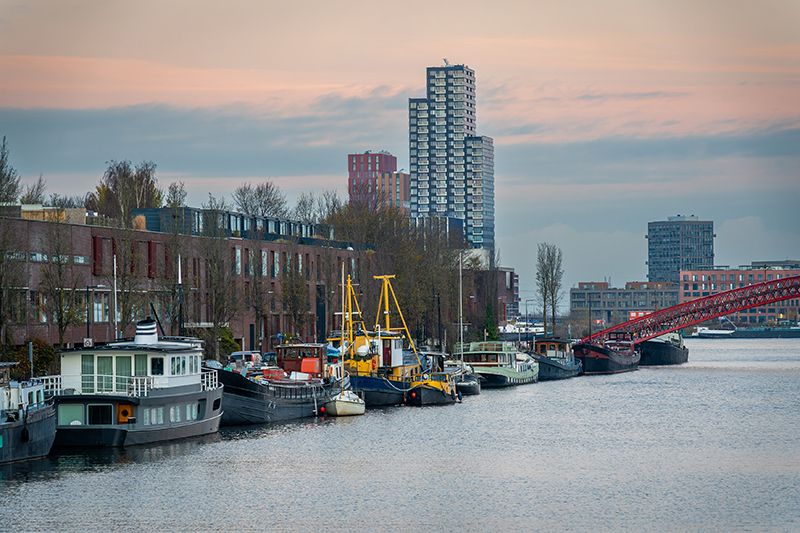 Sunset cityscape of Sporenburg Neighborhood and high-rise buildings at Sluisbuurt neighborhood in Amsterdam-Oost.
