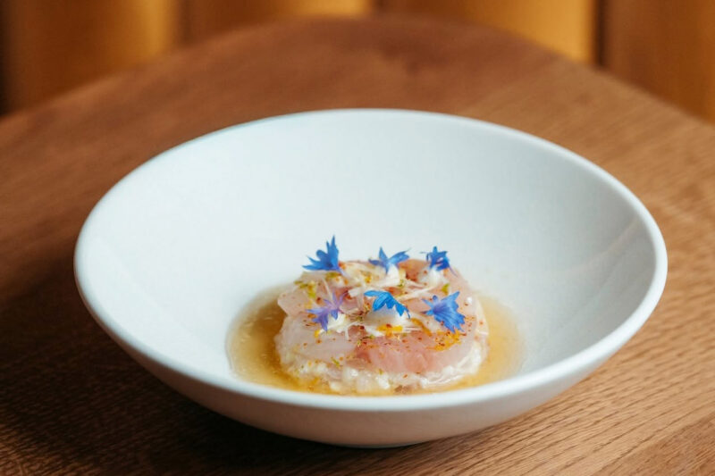 A house favorite for a reason: yellowtail kingfish with bright citrus, leek, and a kick of habanero.
