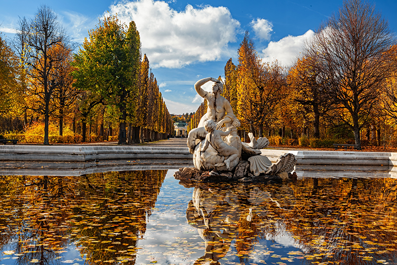 In the gardens of Sch&ouml;nbrunn Palace, a Baroque sculpture of a naiad rests upon a seashell.