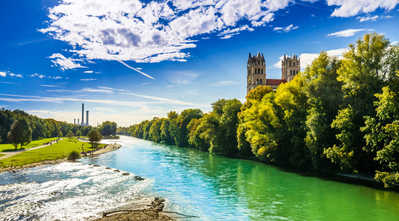 Summer landscape by St. Maximilian church and Isar in Munich.