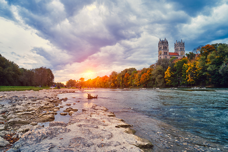 Golden sunset over the Isar River in Munich.